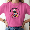 Grandma Kitty’s 4th of July blue t-shirt with patriotic cupcake and cookie logo