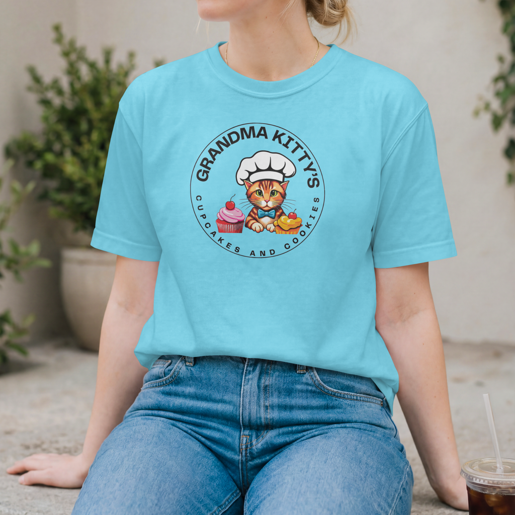 Grandma Kitty’s blue t-shirt with cupcakes and cookies logo