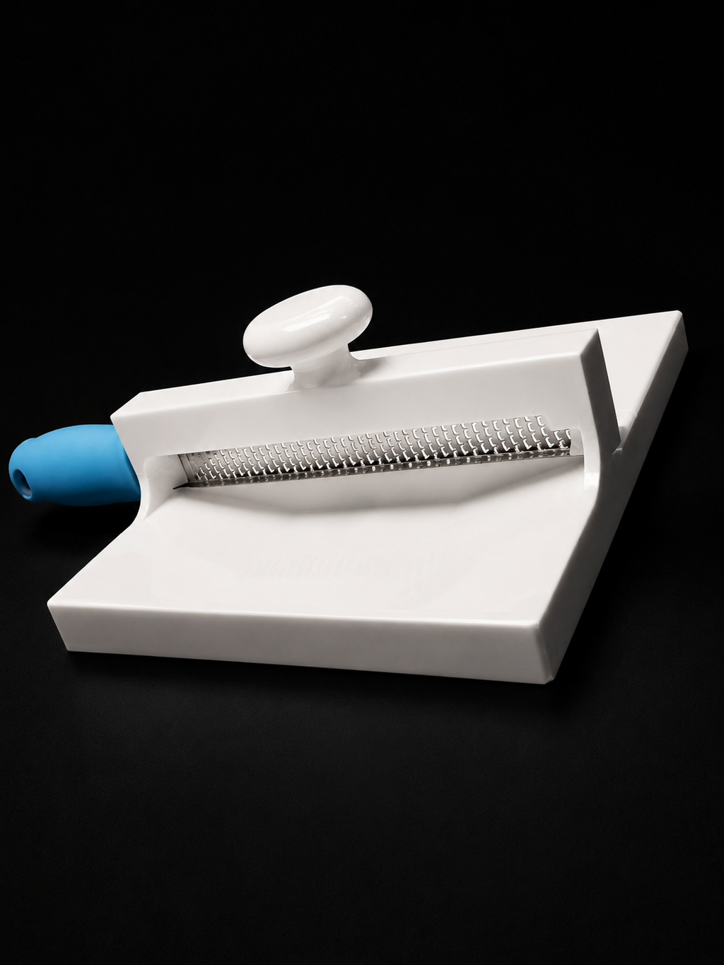 Side view of Grandma Kitty’s 3D printed PETG cookie grater with blue handle grater insert