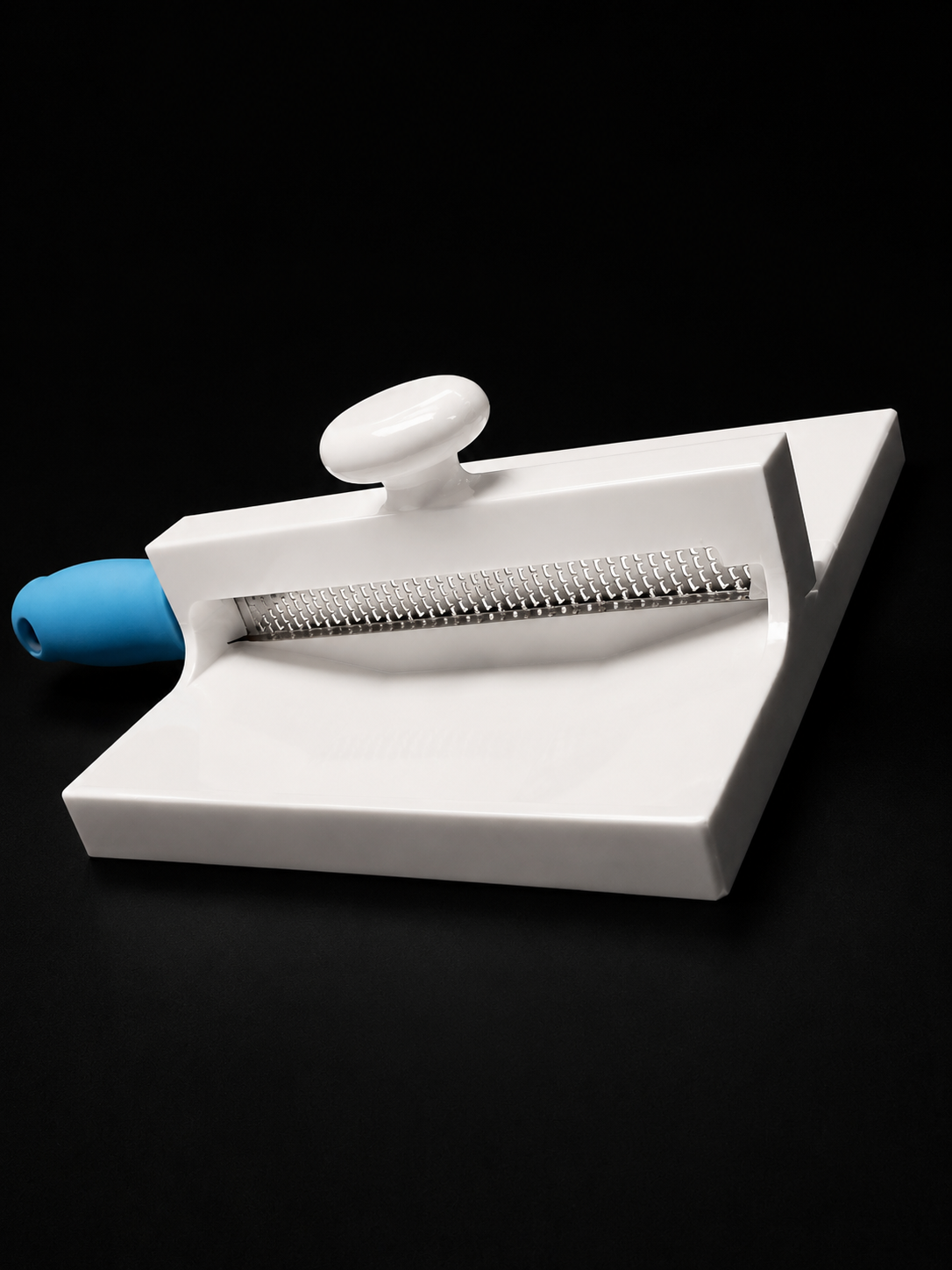 Side view of Grandma Kitty’s 3D printed PETG cookie grater with blue handle grater insert